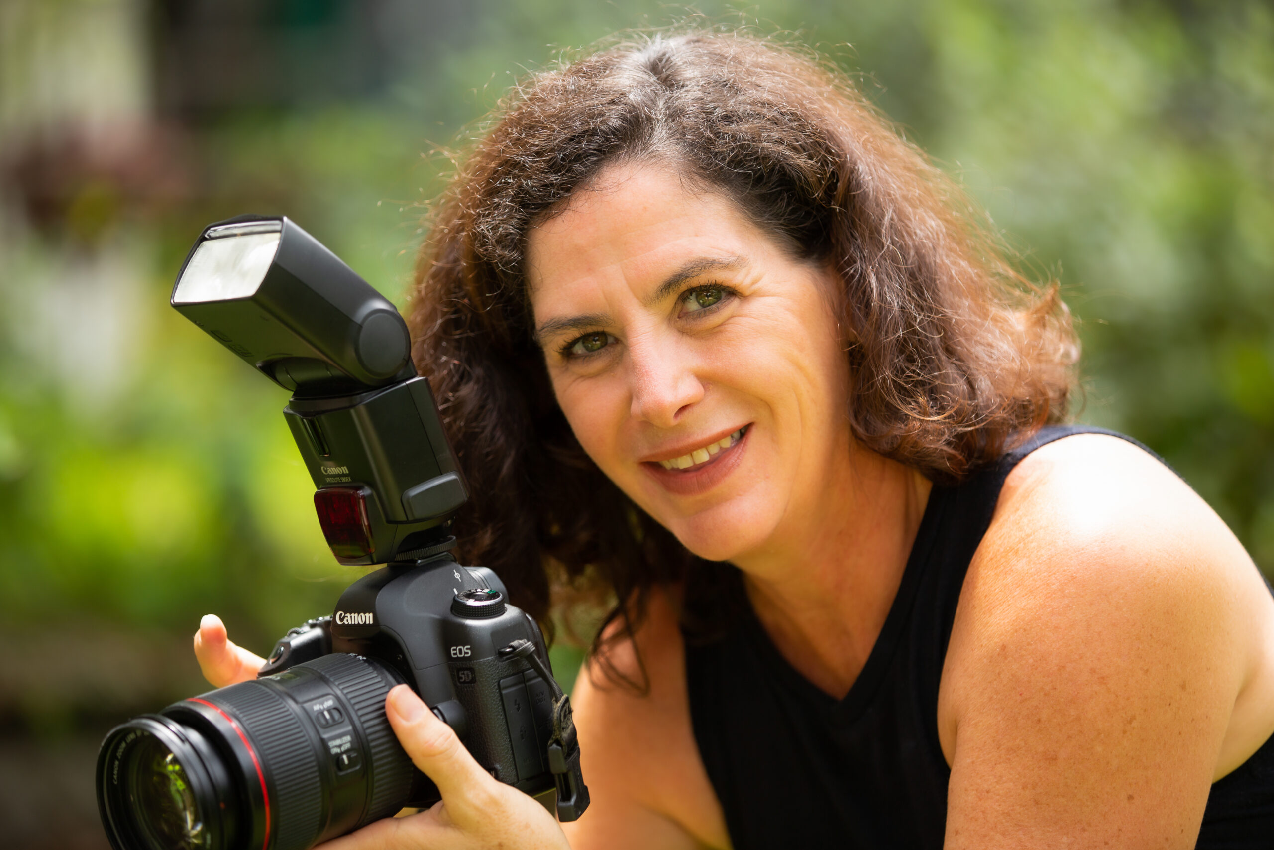 Debra Zumstein photographing ginger lilies